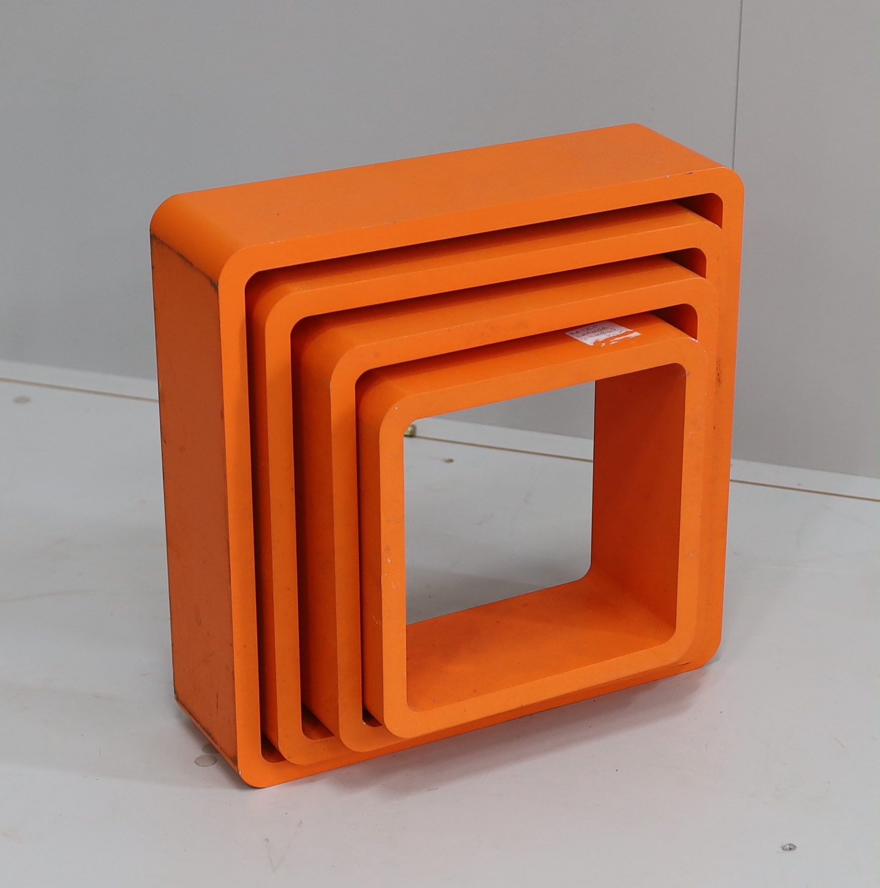 A set of four contemporary wall shelves, largest 41cm